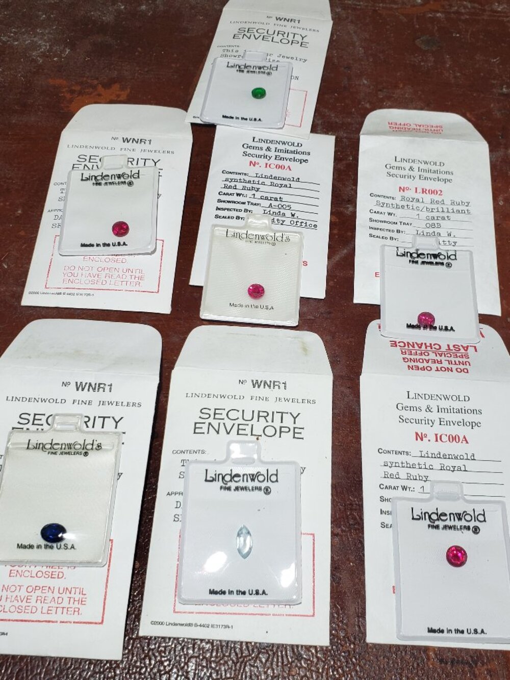 LINDENWOLD FINE JEWELERS RUBIES SAPHIRE EMERALD LAB CREATED GEMS GROUP OF 7